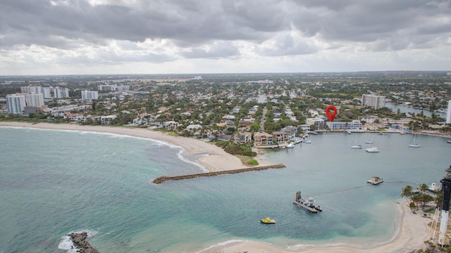 aerial view featuring a water view and a beach view