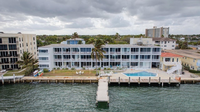 back of house featuring a water view