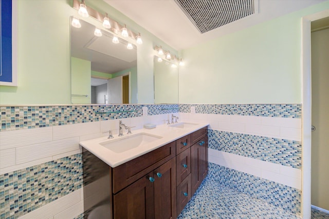 bathroom featuring vanity, tile walls, and tile patterned floors