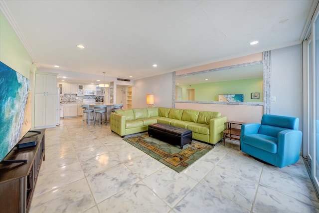 living room with ornamental molding