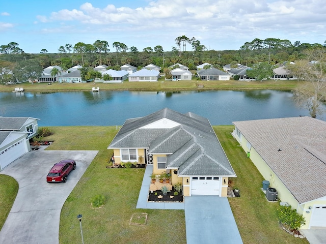 drone / aerial view with a water view