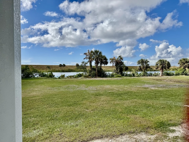 view of yard with a water view