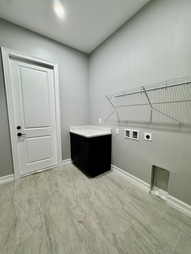 13200 SE US Highway 441, Okeechobee, FL 34974 - laundry area with electric dryer hookup, hookup for a washing machine, and baseboards