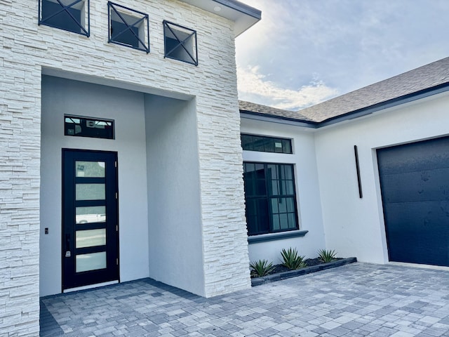 13200 SE US Highway 441, Okeechobee, FL 34974 - view of exterior entry with stone siding and stucco siding