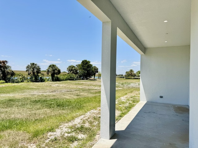 13200 SE US Highway 441, Okeechobee, FL 34974 - view of grassy yard with a patio area