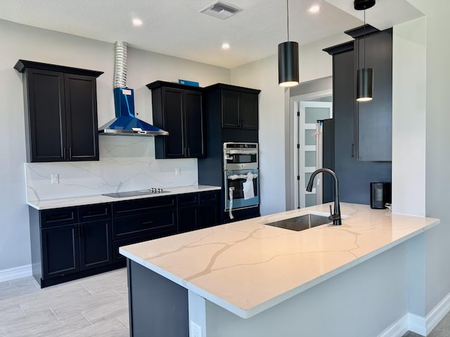 13200 SE US Highway 441, Okeechobee, FL 34974 - kitchen featuring dark cabinets, a sink, black electric cooktop, wall chimney exhaust hood, and recessed lighting