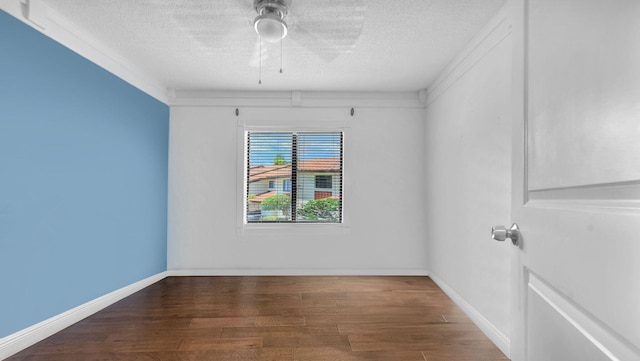 spare room featuring a textured ceiling, hardwood / wood-style flooring, and ceiling fan