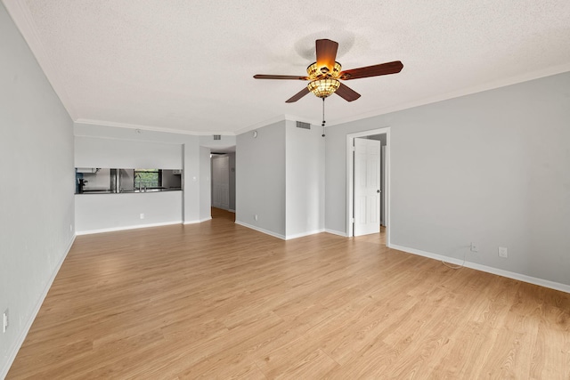 unfurnished living room with a textured ceiling, light wood-type flooring, ceiling fan, and ornamental molding