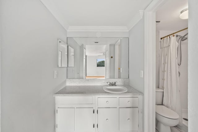 bathroom with curtained shower, crown molding, vanity, and toilet