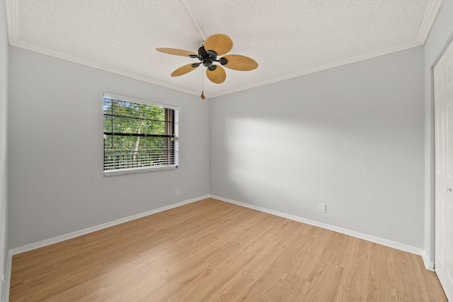 unfurnished room with a textured ceiling, light hardwood / wood-style floors, ceiling fan, and crown molding