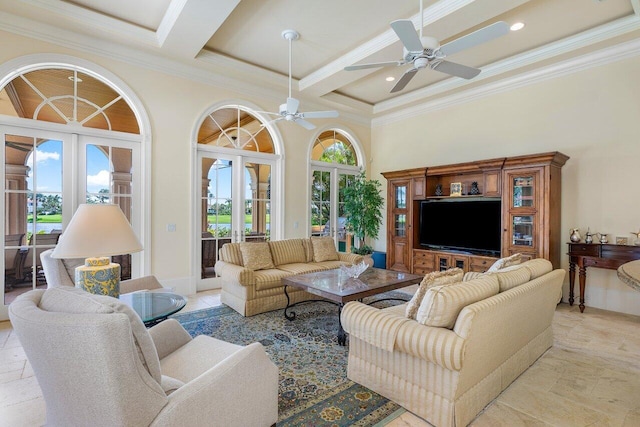 living room featuring beam ceiling, french doors, a towering ceiling, and a healthy amount of sunlight