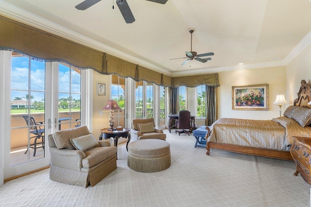 carpeted bedroom with multiple windows, access to exterior, ceiling fan, and ornamental molding