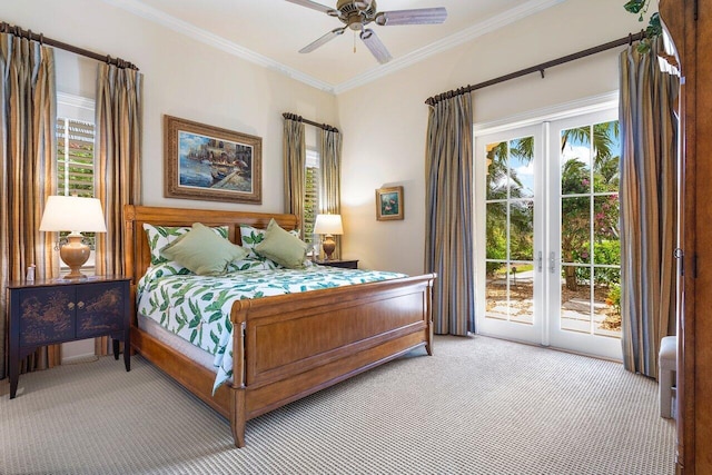 carpeted bedroom with access to outside, multiple windows, and ceiling fan