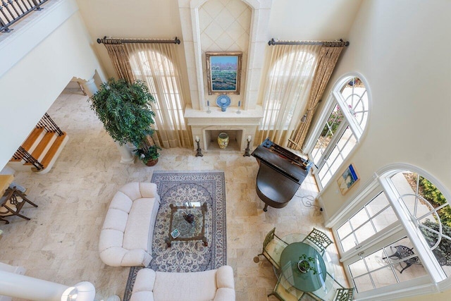 living room with a high ceiling