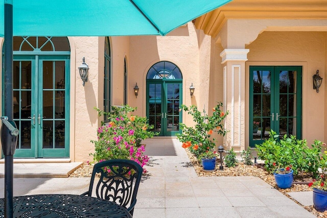 doorway to property featuring french doors