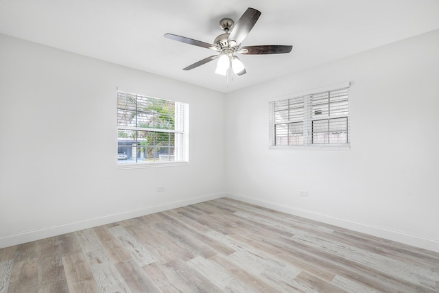 1609 N J Ter, Lake Worth, FL 33460 - unfurnished room featuring light wood-type flooring and ceiling fan