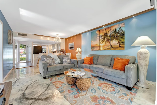 living area featuring marble finish floor, visible vents, crown molding, and baseboards