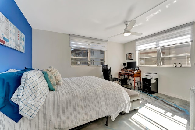 bedroom featuring concrete flooring and ceiling fan