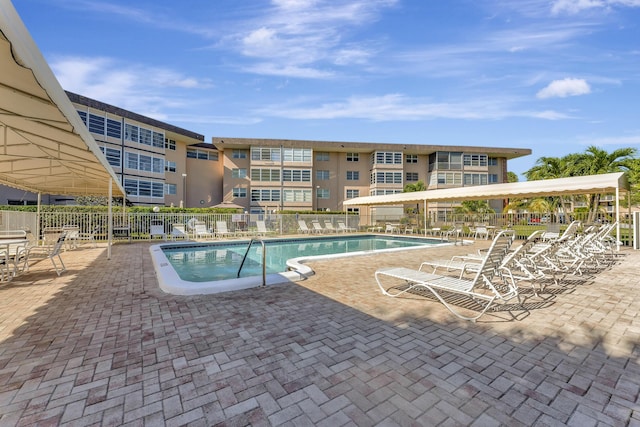 view of swimming pool featuring a patio