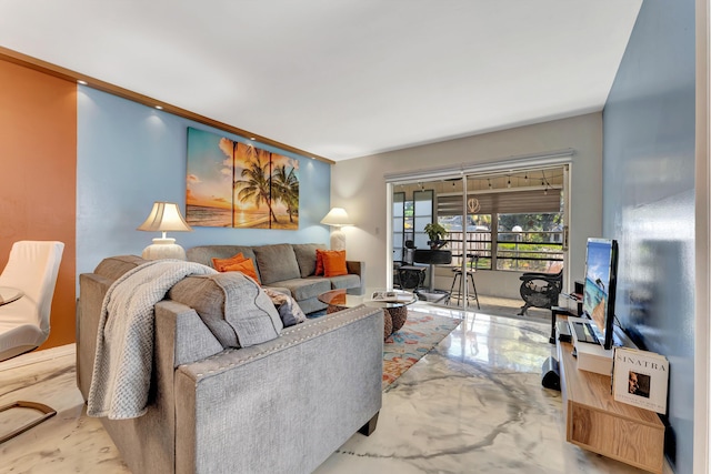 living area with marble finish floor