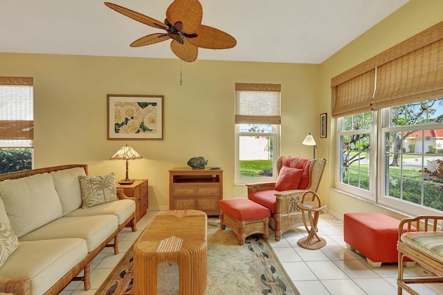 tiled living room with ceiling fan