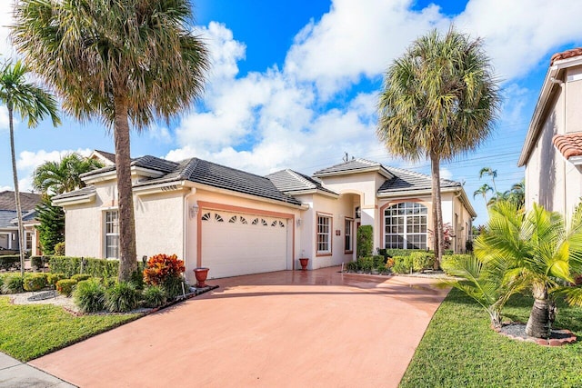 mediterranean / spanish-style house featuring a garage