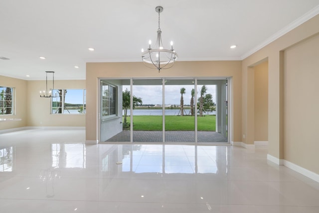 interior space with light tile patterned floors, plenty of natural light, crown molding, and a notable chandelier