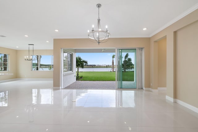 interior space featuring light tile patterned floors, an inviting chandelier, and crown molding