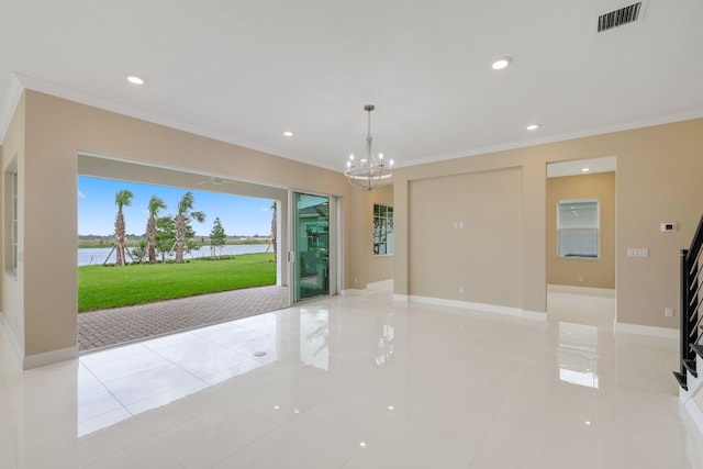 interior space featuring a water view, an inviting chandelier, and ornamental molding