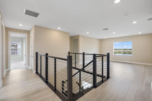 hallway featuring light hardwood / wood-style floors