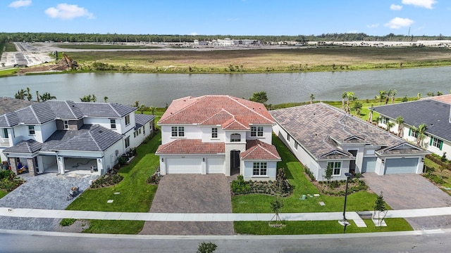 drone / aerial view featuring a water view