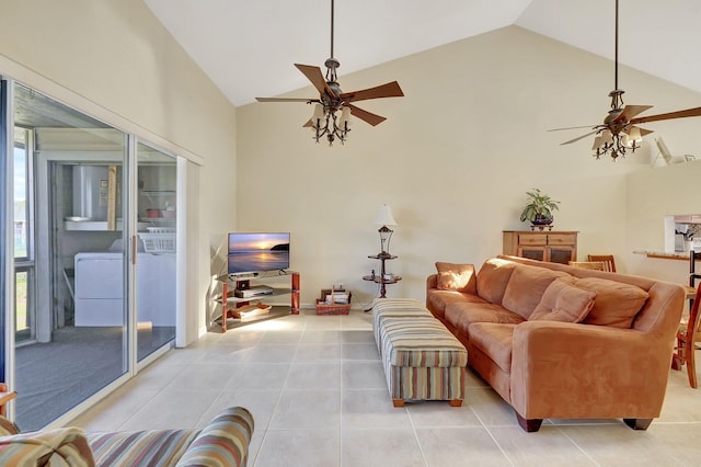 tiled living room featuring ceiling fan and high vaulted ceiling