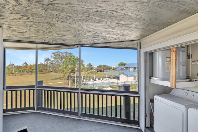 unfurnished sunroom with wood ceiling and a healthy amount of sunlight