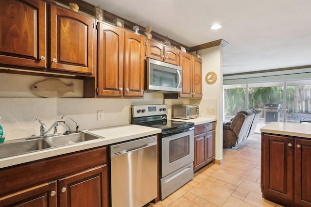 kitchen with appliances with stainless steel finishes and sink