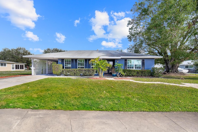 single story home featuring a carport and a front lawn