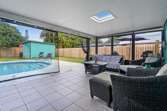 view of pool with a patio area, a shed, and outdoor lounge area