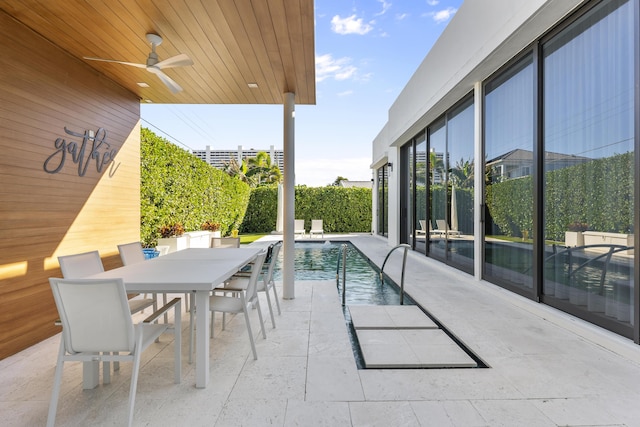 exterior space with a fenced in pool and ceiling fan