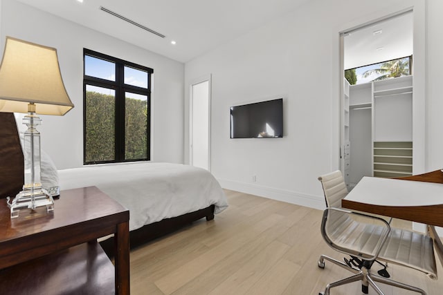 bedroom featuring light hardwood / wood-style floors