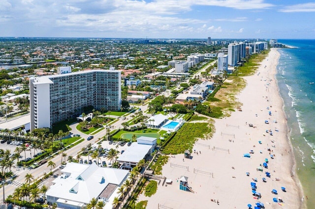 aerial view featuring a water view and a beach view