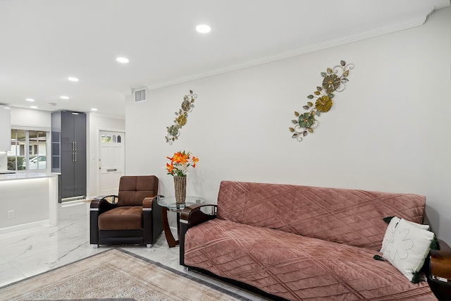 living room with ornamental molding