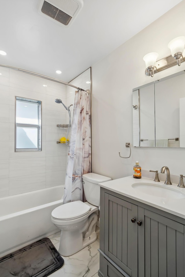 full bathroom with vanity, toilet, and shower / tub combo with curtain