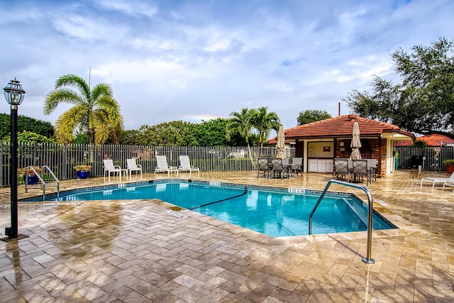 view of pool with a patio area