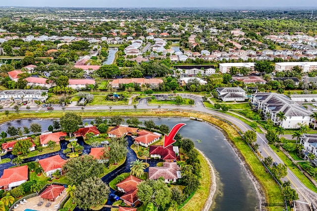 drone / aerial view with a water view