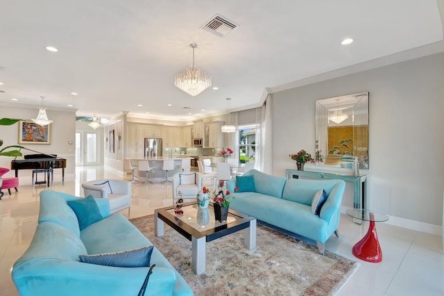 living room featuring light tile patterned floors, crown molding, and a chandelier