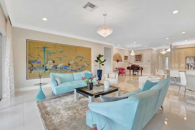 living room with ornamental molding, light tile patterned floors, and a chandelier