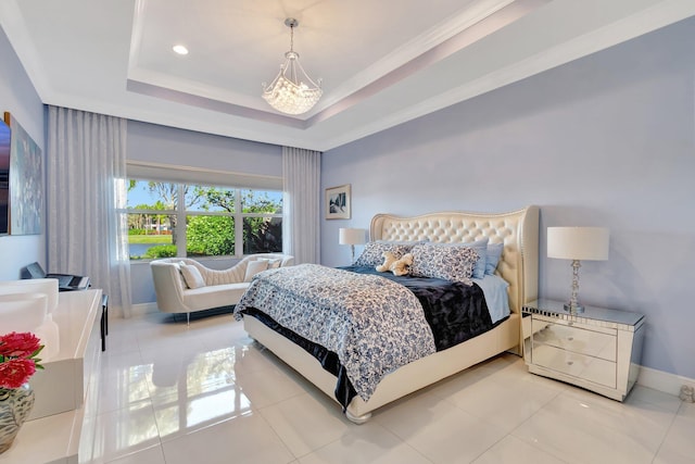 tiled bedroom featuring a chandelier and a tray ceiling