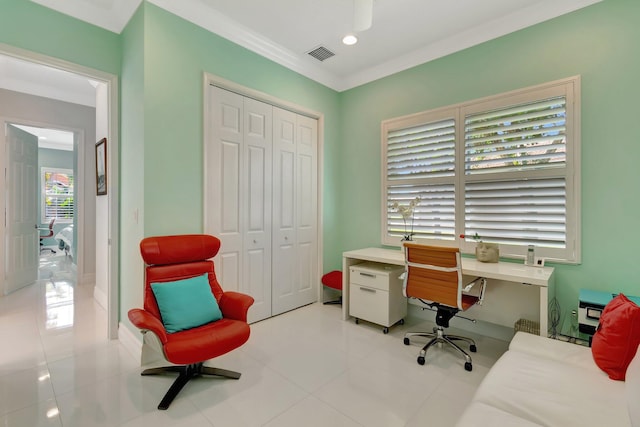 office with light tile patterned flooring and ornamental molding