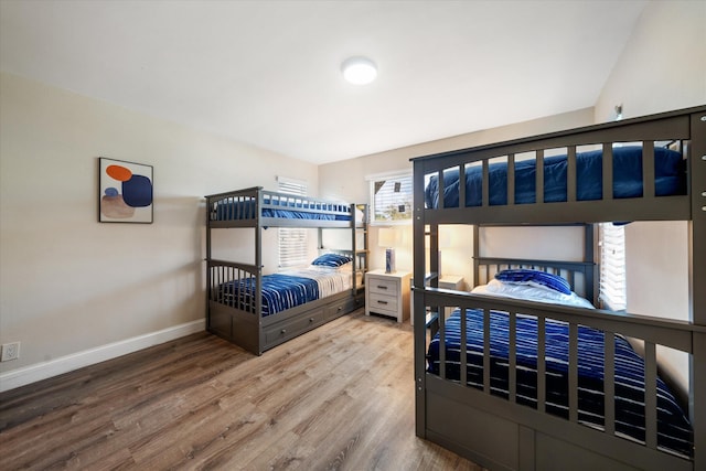 bedroom featuring wood-type flooring