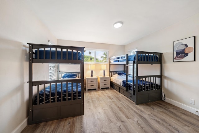 bedroom featuring hardwood / wood-style floors