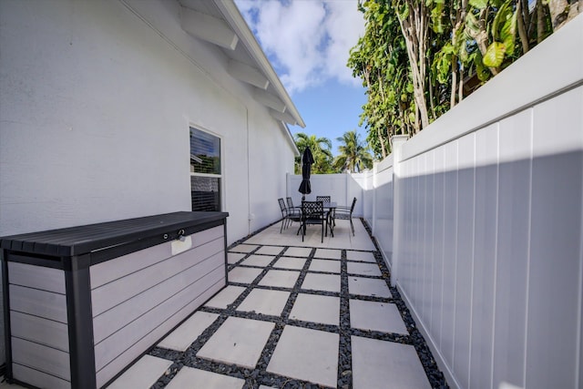 view of patio / terrace featuring a hot tub